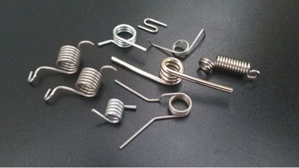 扭轉彈簧應用在那些地方？